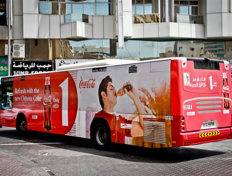Coca-Cola advertising on bus body